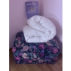 Image 1 : Floral Upholstered Storage Ottoman With Quilts and Cushions
