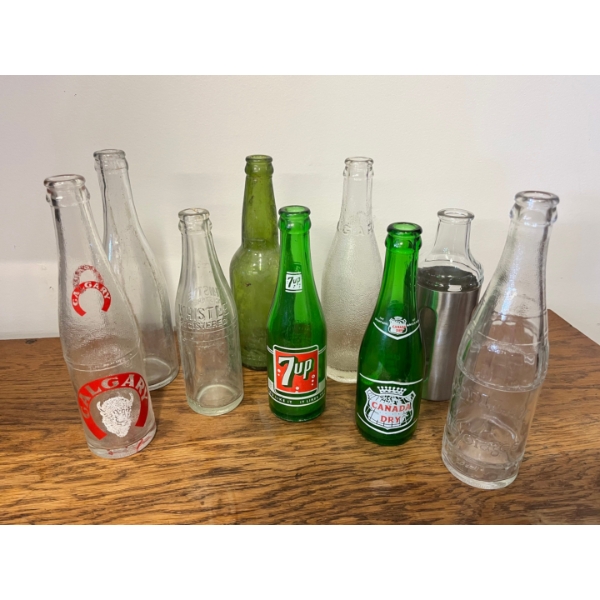 Collection of vintage glass bottles. Canada Dry, 7-up, Antique Capital Beverages, Calgary & more