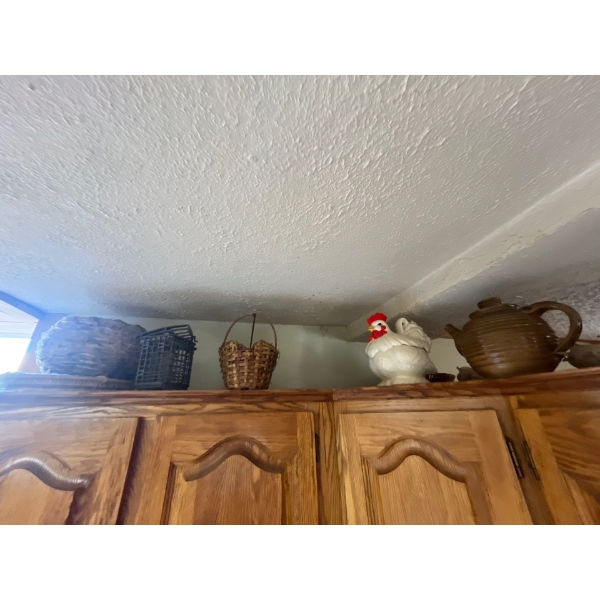  teapot and cookie jars along with a selection of wicker baskets