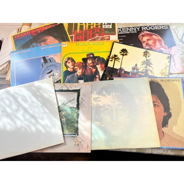 Vinyl records, including Johnny Paycheck, Bee Gees, Kenny Rogers Beach boys Dire Straits, The Beatle