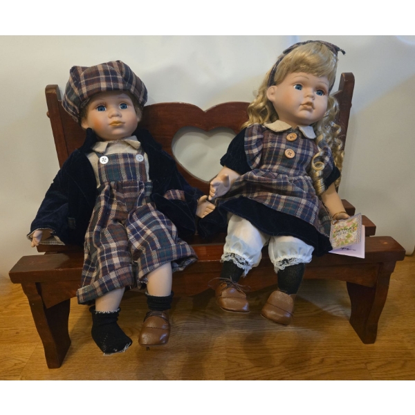 Porcelain Dolls: Brother & Sister on Wooden Bench (Cathy Collection). Tallest is 15T