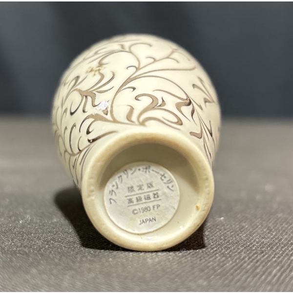 Decorative Collectibles Including Delft Pottery, Bells, and Boxes