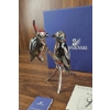 Image 1 : Swarovski Crystal Woodpeckers on a Polished Metal Branch