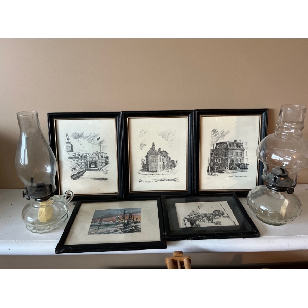 framed pictures from a book by LB Jensen, along with two antique glass oil lamps