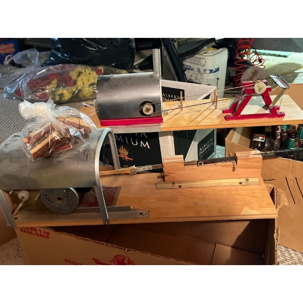 two handmade electric, mini saws, super cool and unique. Includes little wooden tool box 