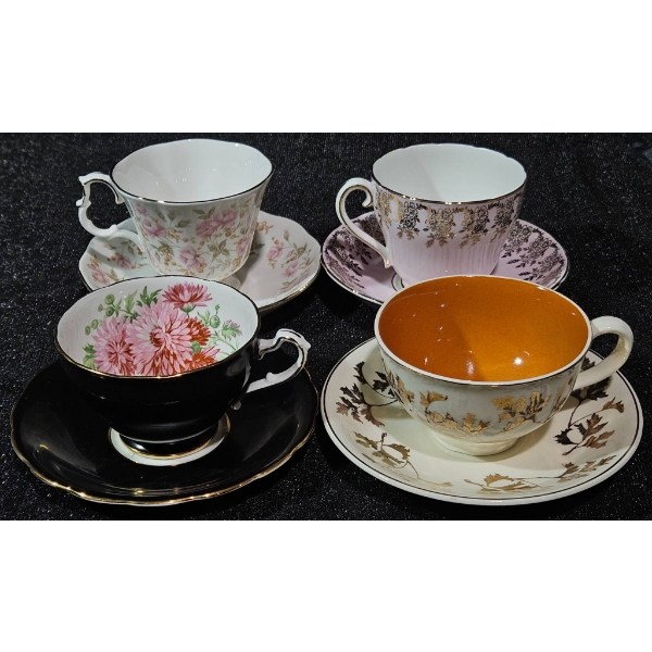 Four Assorted Bone China Cups and Saucers