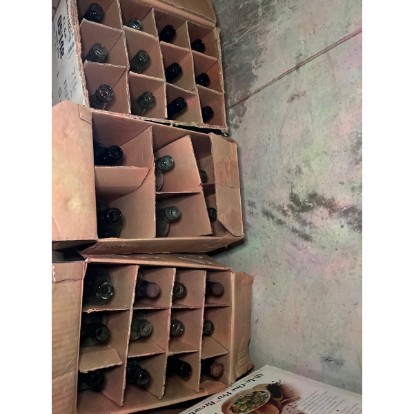 3 boxes of un researched whiskey bottles