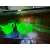 Image 1 :  collection of green uranium glass on shelf four