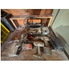 Image 2 : desk with drills, laser level, Mastercraft battery charger and contents in the desk

