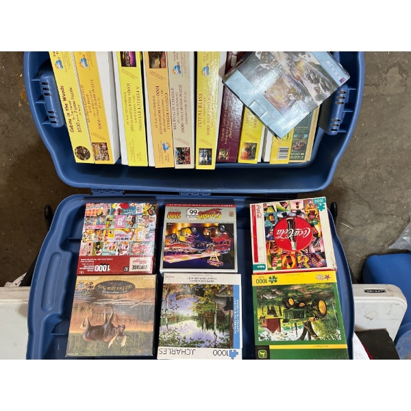 collection of puzzles, including John Deere & Coca-Cola