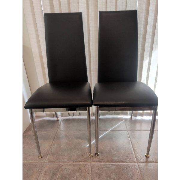 Two Black Faux Leather Dining Chairs with Chrome Legs