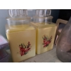 Image 2 : vintage yellow storage containers with three antique jars and milk jugs