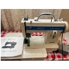 Image 1 : Deluxe, super zigzag, Titan, sewing machine with extra thread spindles, thread holder, in great work