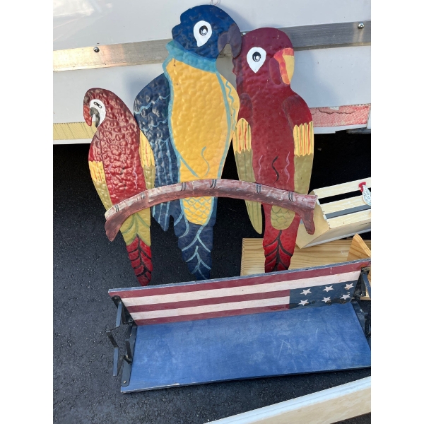 collection of shelves and a tin parrot decor wall hanger.