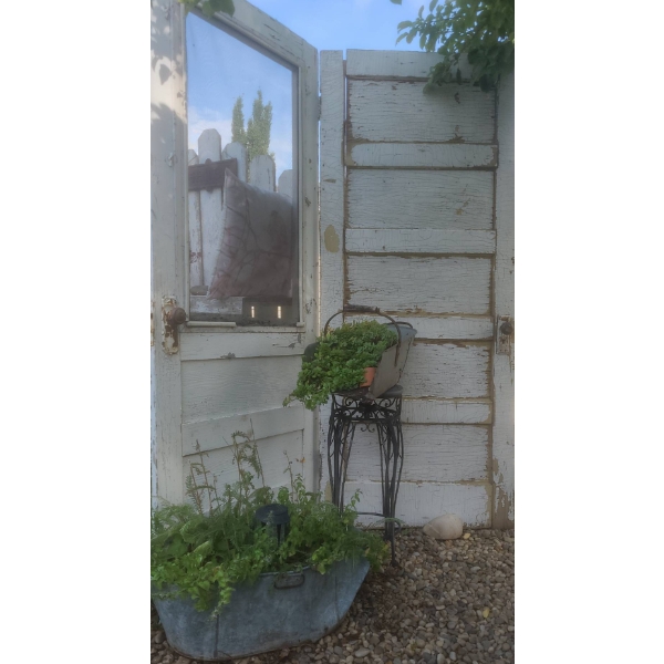 Two Rustic White Wooden Doors With Hardware And Glass Pane