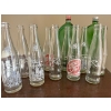  vintage Lucky One beverage bottles, likely from the 1970s