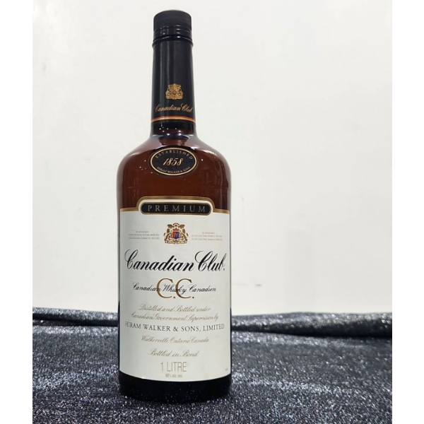 1 LITRE of Sealed Canadian Club Whiskey