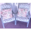 Image 4 : Glass Patio Table with Metal Frame, Two Chairs, Cushions, and Decorative Accents
