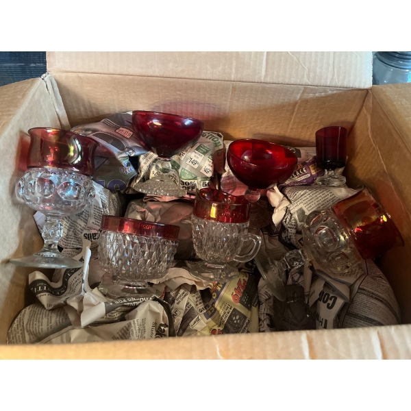 box for of red coloured crystal stemware