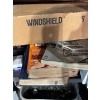 Image 3 : metal shelf with miscellaneous items, box full of sand, paper, brand new windshield, wiper blades