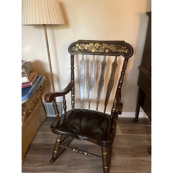 Vintage rocking chair and brass lamp with shade