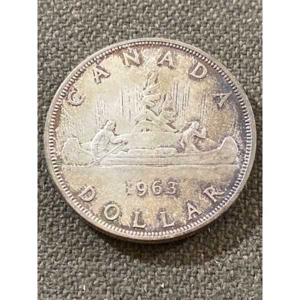 1963 Canada Silver Dollar Coin Featuring Canoe Design