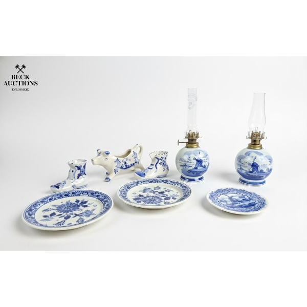  Collection Of Vintage Dutch Delftware (Oil Lamps ,  Ceramic Plates, A Cow Creamer, And Decorative)