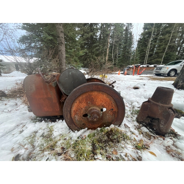 antique water pump and drill head used for Alberta mining and drilling