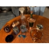 Image 1 : collection of carnival glass, piggy banks, whiskey, bottles, and decanters, and a vintage globe from