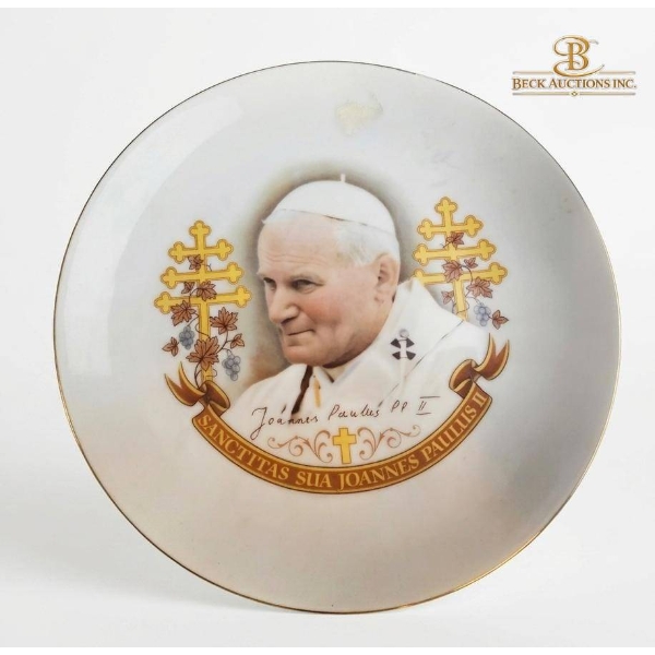 Decorative Plates, Teacups, and Saucers With Floral and Figurative Motifs