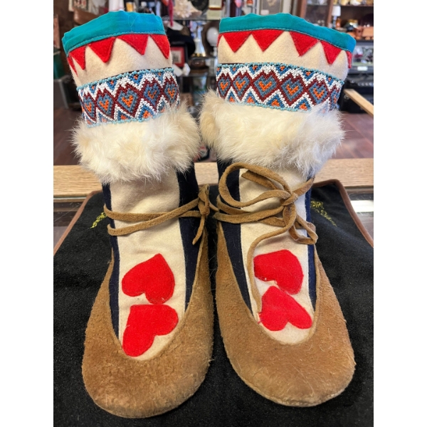  Handcrafted Canadian Indigenous mukluks feature intricate beadwork and red heart appliqué 
