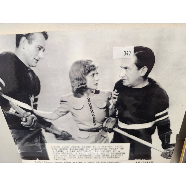 Black-and-White Hockey-Themed Film Stills on Display Boards