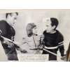 Image 1 : Black-and-White Hockey-Themed Film Stills on Display Boards