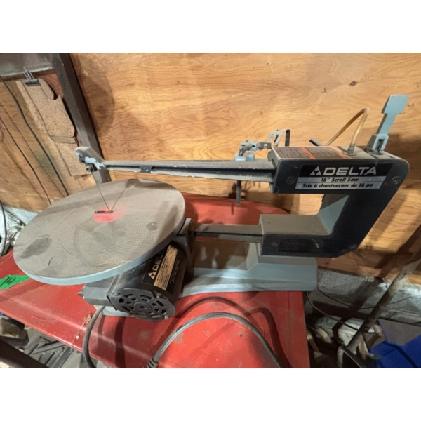 Delta 16 inch scroll saw heavy duty solid cast iron base in great working condition
