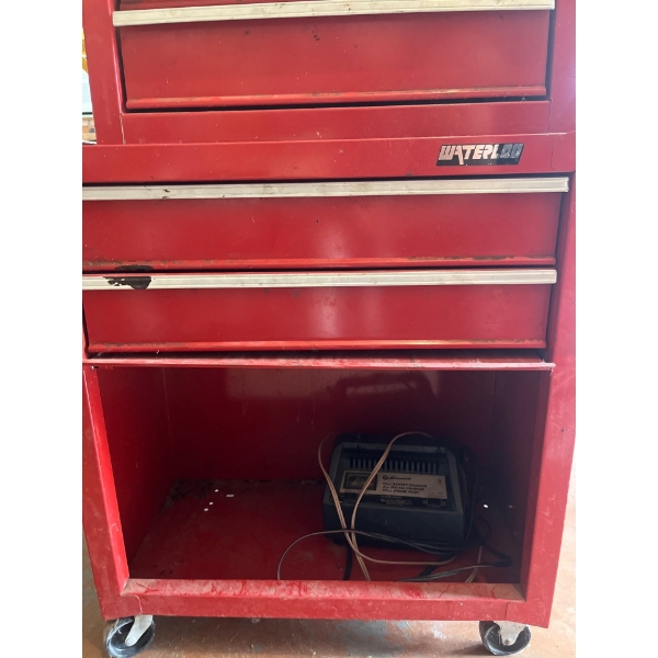  red rolling two piece tool box with all consents