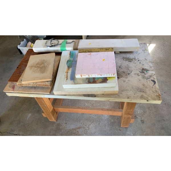 Wood Shop Table With Art Supplies Canvasses