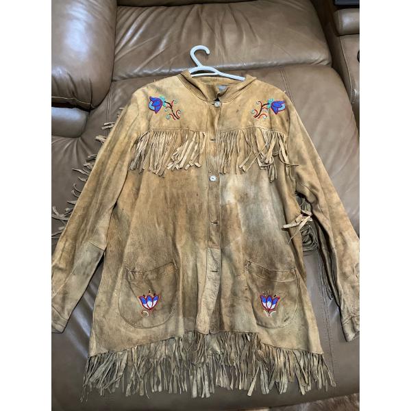  Vintage Hand Made 3/4 length Deer skin Jacket
With Lovely bead work on the front .