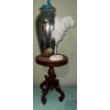 Image 4 : Round Wood Pedestal Table with Glass Vase, Feather Pen, and Base