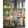 Image 1 : Contents of Garage Cupboard and Drawers- Fertilizer, Cleaning Products, Utility Gloves and More!
