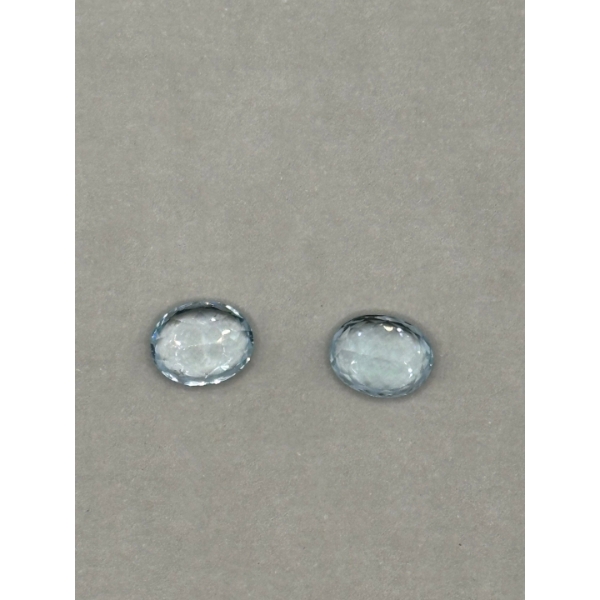 two blue topaz gemstones oval in shape total weight 6.27 carats 3.08 carat & 3.19 carat