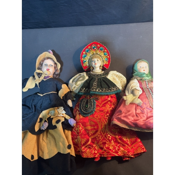 Three Cloth and Porcelain Dolls