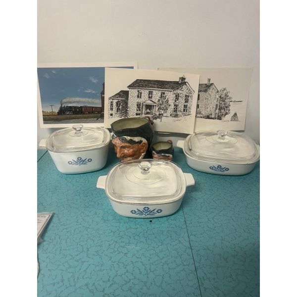Vintage Corning Ware set with three casserole dishes with glass lids with the Blue Cornflower patter