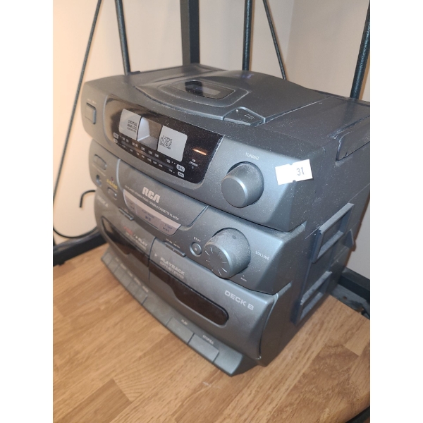 RCA RP7954 Portable CD/ Radio/ Cassette Player, Shelving 27 W, 16 D, 69 T (Middle Shelf Loose)