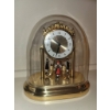 Image 4 : West Germany-Made Decorative Mantle Clock with Rotating Figures and Dome