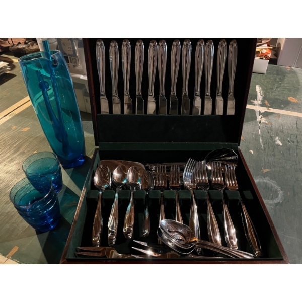 silver plated Oneida cutlery, set with blue hand, blowing water jug and five matching glasses.