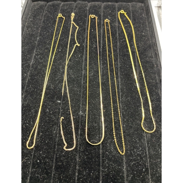 Collection of 5 "Gold" Necklaces. One is 10k gold 2.89g