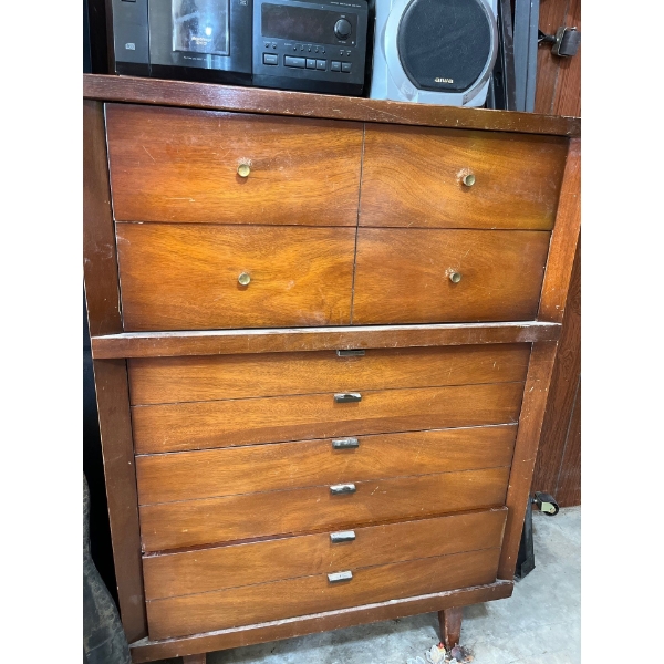 solid wood dresser with dovetailed corners Made by Huntley Furniture .