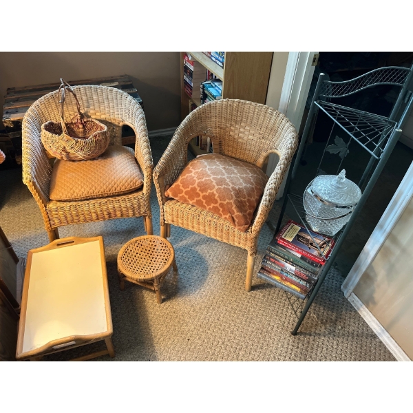 Two vintage wicker chairs with a TV tray, a small wicker foot rest and two wicker baskets and a love