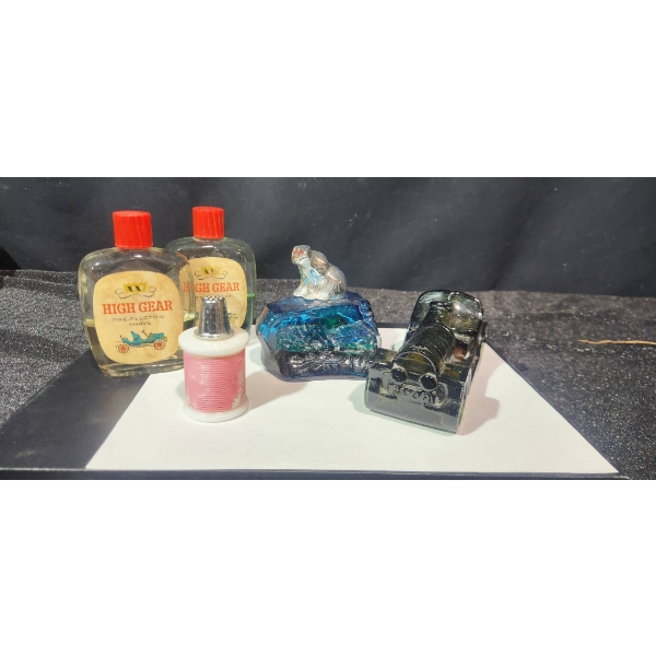 Vintage-Style Perfume and Aftershave Bottles with Partial Contents