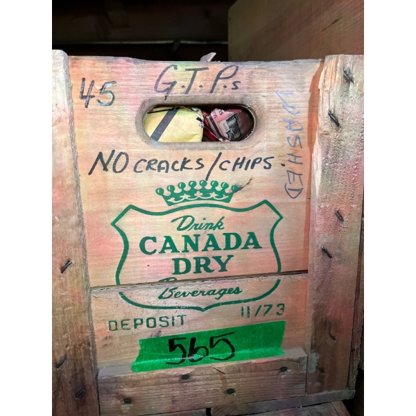 G.T.P insulators 45 in total they have all been washed no cracks and chips in a Canada dry crate. 